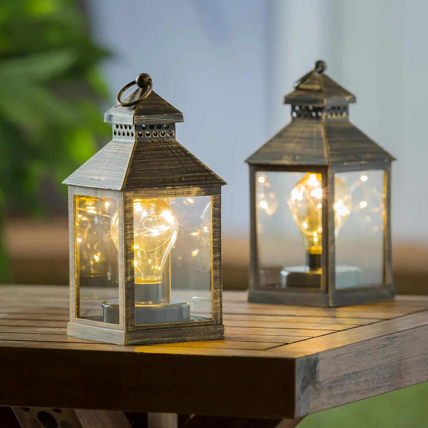 Outdoor Lamps | Candles & Lanterns>Plow & Hearth 8.5"H Battery Operated Twinkling Light Bulb Lantern, Black with Brushed Gold, Set of 2